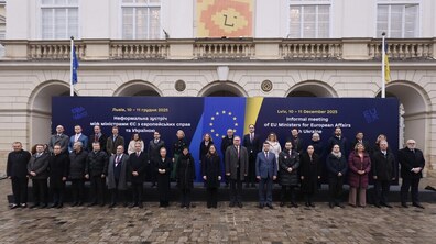 Three dozen representatives of European countries in front of the Lviv City Council against the backdrop of a banner reading ‘Informal meeting between EU ministers for European affairs and Ukraine’
