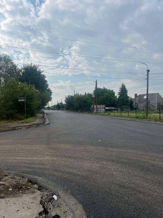 Фото 3: Вулицю Шевченка заасфальтували, але ще впорядковують територію: рух тимчасово перекритий