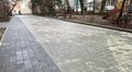 Біля будинку на вул. Мельника, 8а відремонтували тротуар і дорогу: мешканці зібрали на ці роботи 100 тис. грн