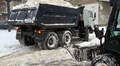 Комунальні служби Львова вивозять накопичений сніг із вулиць міста