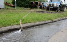Фото 10: Ремонт вул. Хуторівка: підрядник стелить перший і другий шар асфальтобетону