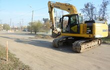 Фото 5: На вул. Курмановича розпочато ремонтні роботи: працює важка техніка, дорогу перекрито для руху транспорту