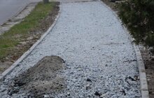 Фото 2: На вул. Княгині Ольги тривають роботи з будівництва велодоріжки