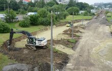 Фото 6: Ремонт вул. Хуторівка: підрядник стелить перший і другий шар асфальтобетону