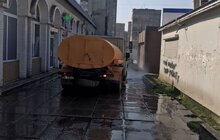 Фото 76: Комунальні служби дезінфікують місто: миють вулиці, тротуари, зупинки транспорту, сходові клітки будинків