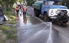 Фото 23: Комунальні служби продовжують миття міста