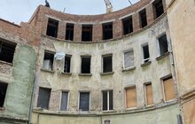 Фото 4: У будинках на вул. Стрийській, які постраждали в липні від обстрілу, вже монтують перекриття між поверхами та дахи