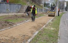 Фото 7: На вул. Княгині Ольги тривають роботи з будівництва велодоріжки