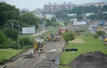 Фото 5: Ремонт вул. Хуторівка: підрядник стелить перший і другий шар асфальтобетону