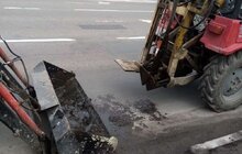 Фото 7: У Львові очистили близько 9 тисяч дощоприймачів: з них витягували не лише пісок, а й пляшки, пластиковий посуд та навіть айфон