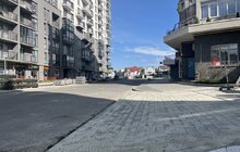 Фото 5: Реконструкція вул. Залізничної: на перехресті з вул. Ясною облаштовують кільцевий рух