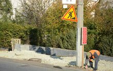 Фото 1: На вул. Княгині Ольги розпочали роботи з будівництва велосипедної доріжки та хідників