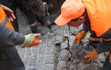 Фото 1: На вул. Галицькій проводять поточний ремонт пішохідної частини