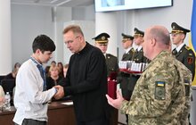 Фото 6: У Львові 29 захисників посмертно нагородили «Почесним знаком Святого Юрія» за оборону України (фото) 