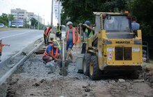 Фото 11: На вул. Княгині Ольги тривають роботи з будівництва велодоріжки
