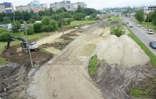 Фото 4: Ремонт вул. Хуторівка: підрядник стелить перший і другий шар асфальтобетону