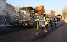 Фото 9: Реконструкція вул. Б. Хмельницького: на відрізку від вул. Механічної до вул. Олійної стелять нижній шар асфальту