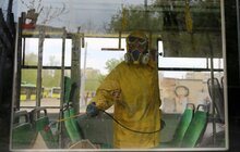 Фото 9: Усі тролейбуси, які виїжджають на рейси, миють і дезінфікують двічі на день — зранку і ввечері