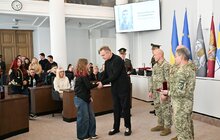 Фото 7: У Львові 29 захисників посмертно нагородили «Почесним знаком Святого Юрія» за оборону України (фото) 