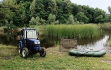 Фото 2: 15 кубічних метрів водних рослин та намулу: у парку «Знесіння» чистять ставок