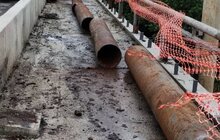 Фото 1: Львівводоканал замінив аварійний водопровід, який проходив по мосту на вул. Городоцька-Сяйво