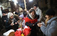 Фото 5: У Львові провели першу різдвяну екскурсію з пампухами, колядою і історіями про святкування 100 років тому (відео)