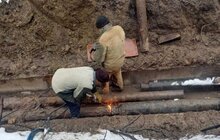 Фото 1: На вул. Симоненка ремонтні бригади Львівтеплоенерго проводять заміну теплової мережі