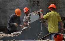 Фото 12: Місяць після найбільшого обстрілу у Львові: що зроблено за цей час (відео)