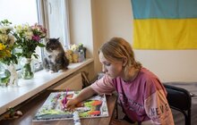 Фото 7: У Львові для переселенців та врятованих ними котів влаштували фотосесію