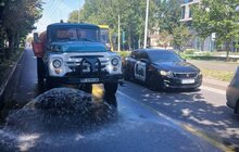 Фото 4: У Львові через спеку поливають дороги й трамвайні колії та обмежують в’їзд великовагового транспорту (відео)