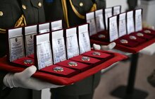 Фото 2: У Львові 29 захисників посмертно нагородили «Почесним знаком Святого Юрія» за оборону України (фото) 