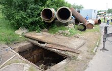 Фото 11: Ремонт вул. Хуторівка: підрядник стелить перший і другий шар асфальтобетону