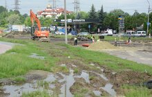 Фото 14: Ремонт вул. Хуторівка: підрядник стелить перший і другий шар асфальтобетону