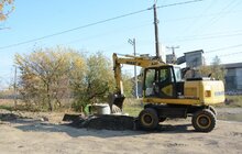 Фото 4: На вул. Курмановича розпочато ремонтні роботи: працює важка техніка, дорогу перекрито для руху транспорту