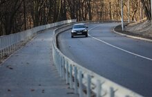 Фото 5: На вул. Личаківській на відрізку від «Ензиму» до вул. Букової постелили верхній шар асфальту: вулиця відкрита для проїзду