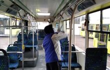 Фото 8: Комунальні служби продовжують дезінфікувати місто: миють вулиці, тротуари, зупинки транспорту, сходові клітки будинків