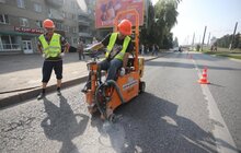 Фото 2: На вул. Кн. Ольги проводять ремонтні роботи із запобігання руйнуванню дороги за методикою, яку застосовують при ремонті великих магістралей державного значення