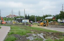 Фото 13: Ремонт вул. Хуторівка: підрядник стелить перший і другий шар асфальтобетону