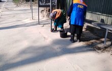 Фото 87: Комунальні служби дезінфікують місто: миють вулиці, тротуари, зупинки транспорту, сходові клітки будинків
