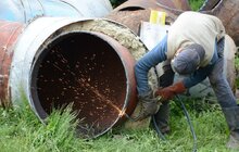 Фото 12: Ремонт вул. Хуторівка: підрядник стелить перший і другий шар асфальтобетону