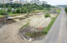 Фото 3: Ремонт вул. Хуторівка: підрядник стелить перший і другий шар асфальтобетону
