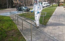 Фото 30: Комунальні служби дезінфікують місто: миють вулиці, тротуари, зупинки транспорту, сходові клітки будинків